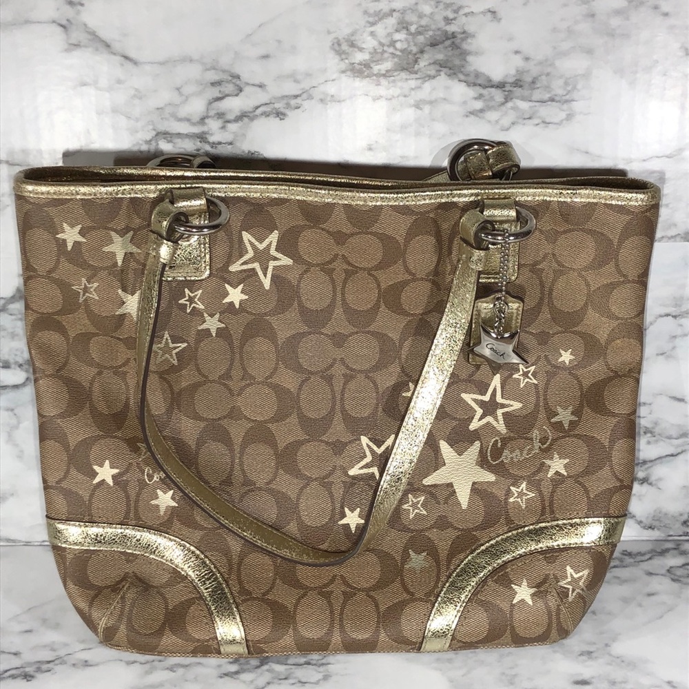 Coach purse with gold star details